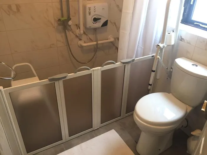 Level Access Shower Tray Enclosures with Half Doors and toilet aids