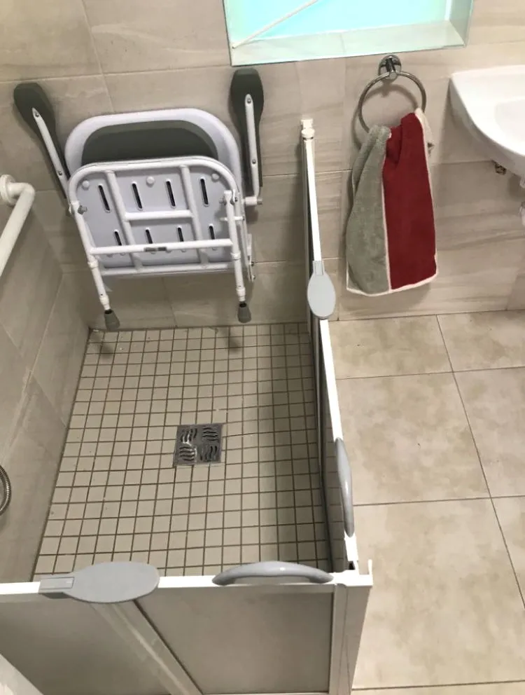 Level Access Shower and wall mounted shower seat